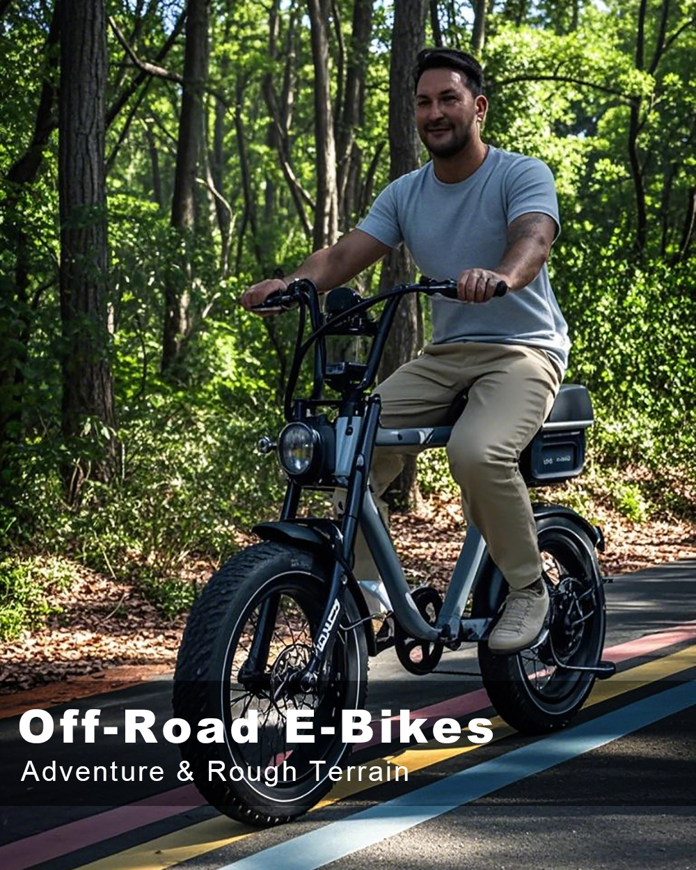 Jobo off-road electric bike riding on rocky mountain trail with fat tires and dual suspension