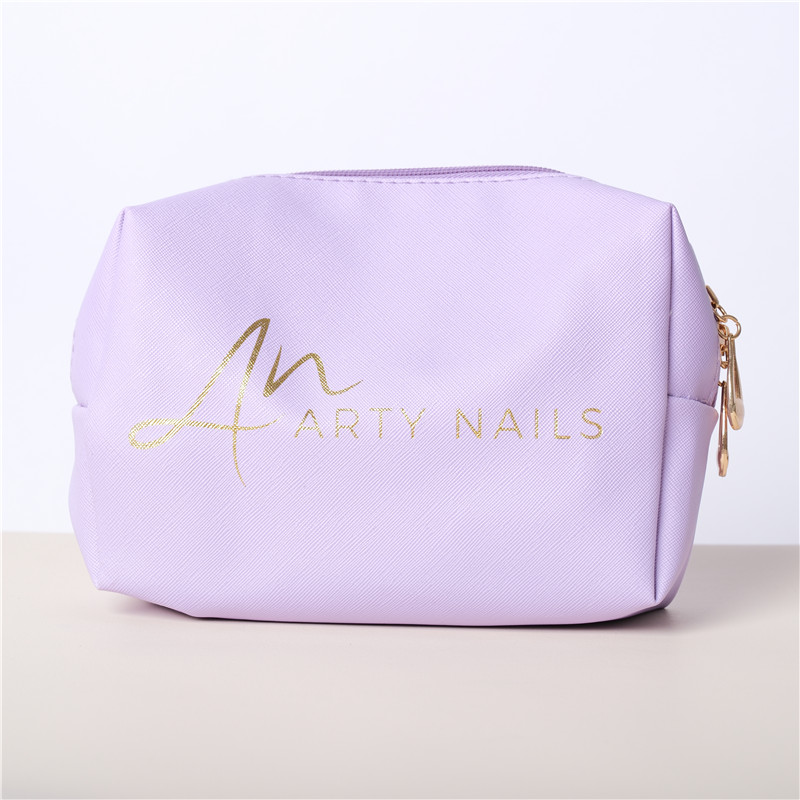 Bulk cosmetic bags in different styles, produced by Luckystar with custom branding