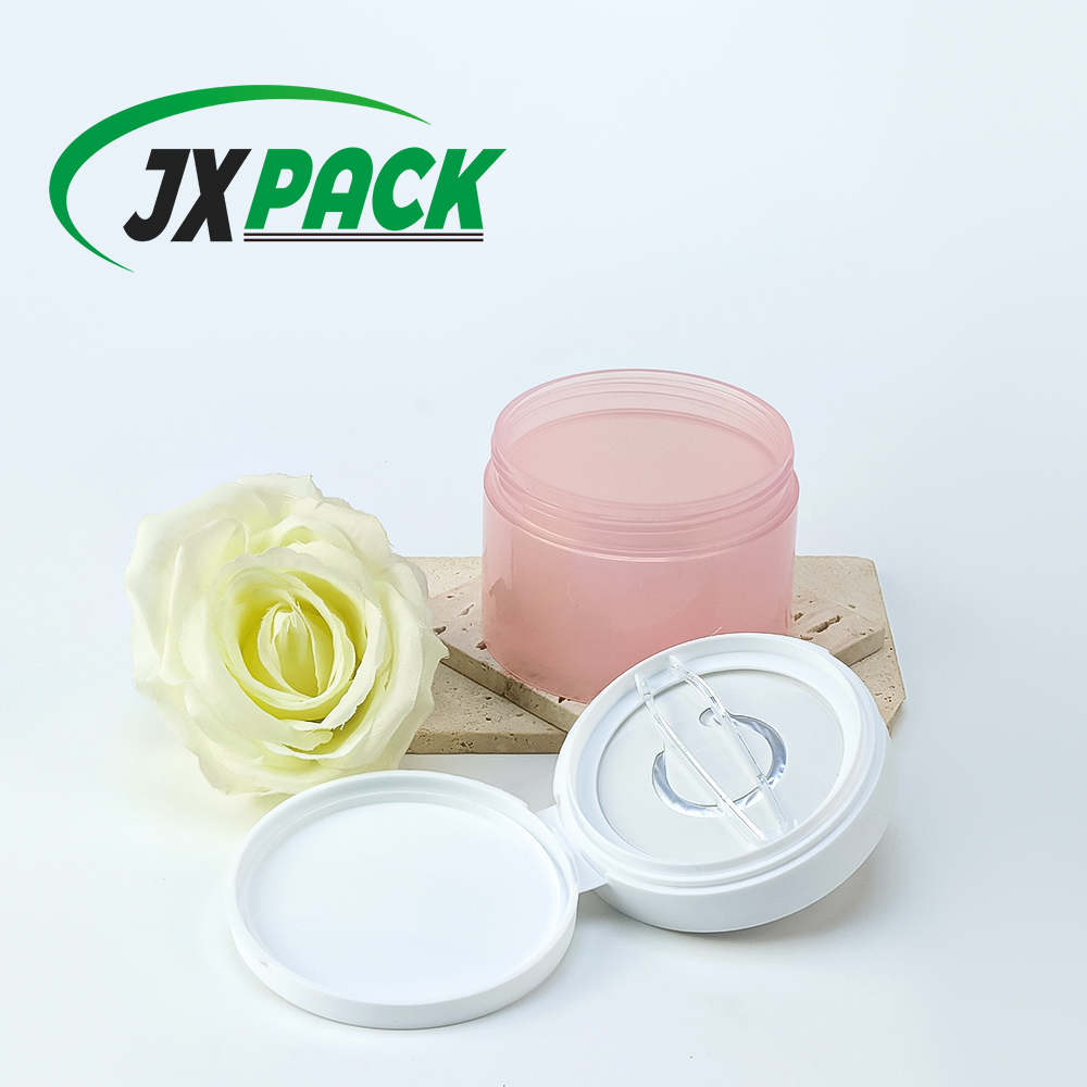 JXPACK flip-top cosmetic jar with a spoon